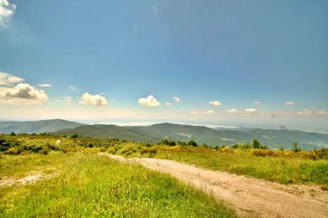 A Panoramic View From Monte Ginezzo On The Rocca di Pierle Walk With Lake Trasimeno In The Distance.