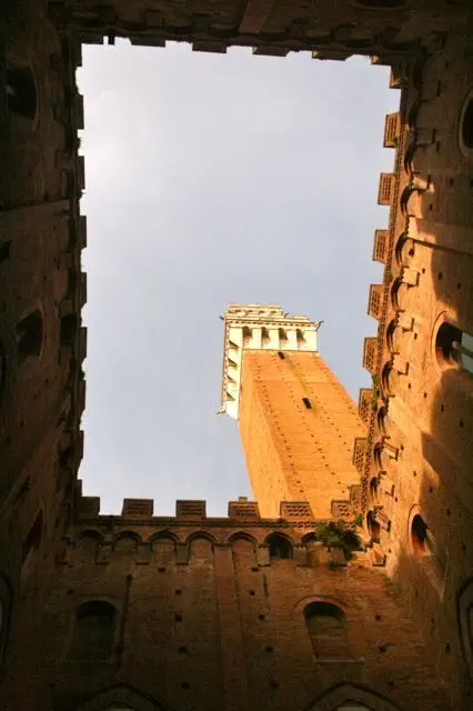 The Torre del Mangia seen from the courtyard inside the Palazzo Civico, Siena, Tuscany