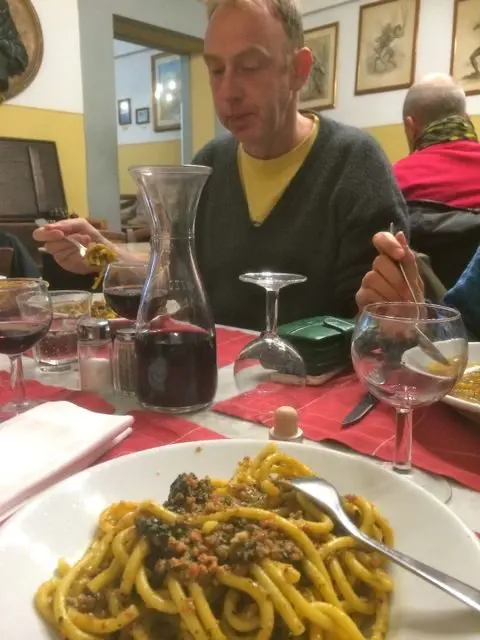 Pici (thick spaghetti) with sausage and Tuscan black cabbage 