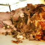Porchetta is whole roast pig sold from vans on the side of the road in Italy